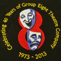 Logo and text on left breast.